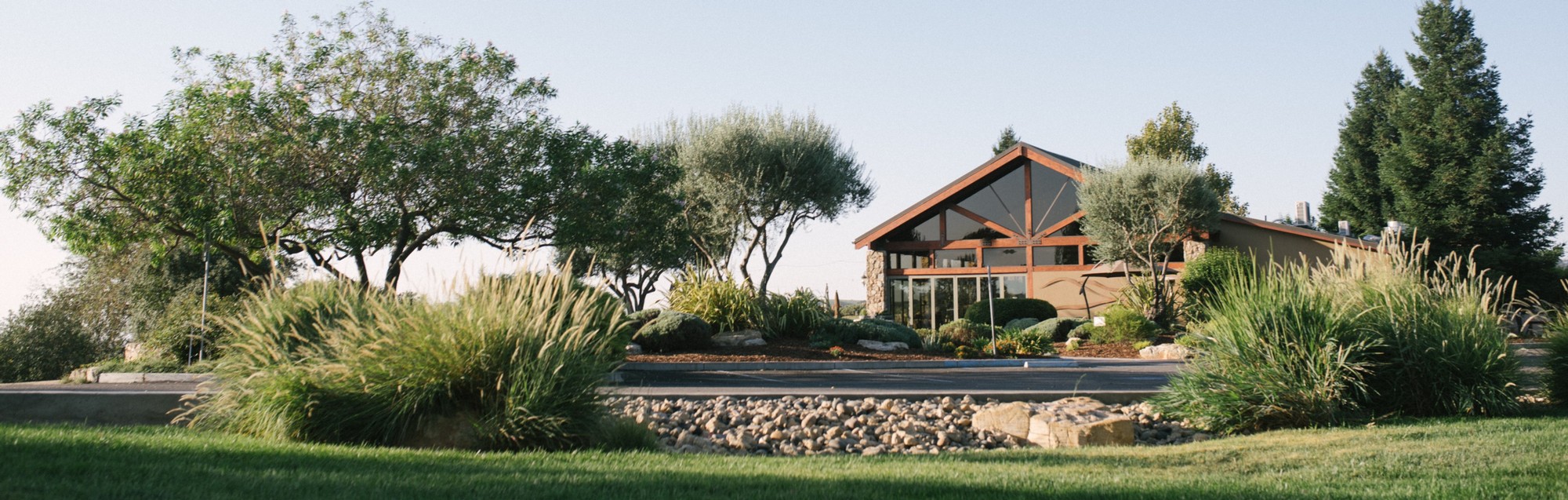 A wide perspective of the front of the tasting room at Calcareous Vineyard in Paso Robles, CA