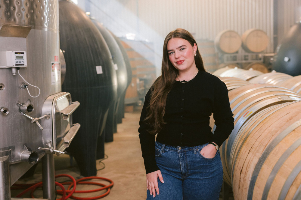 woman standing in wine cellar