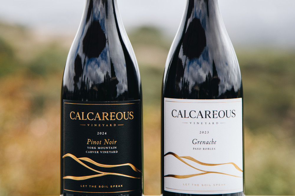 Three bottles on wine on a wine box