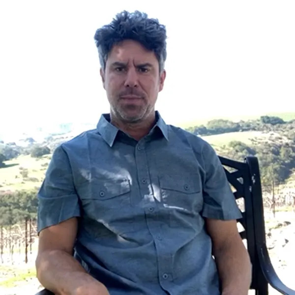 Jason Joyce Sitting in Vineyard